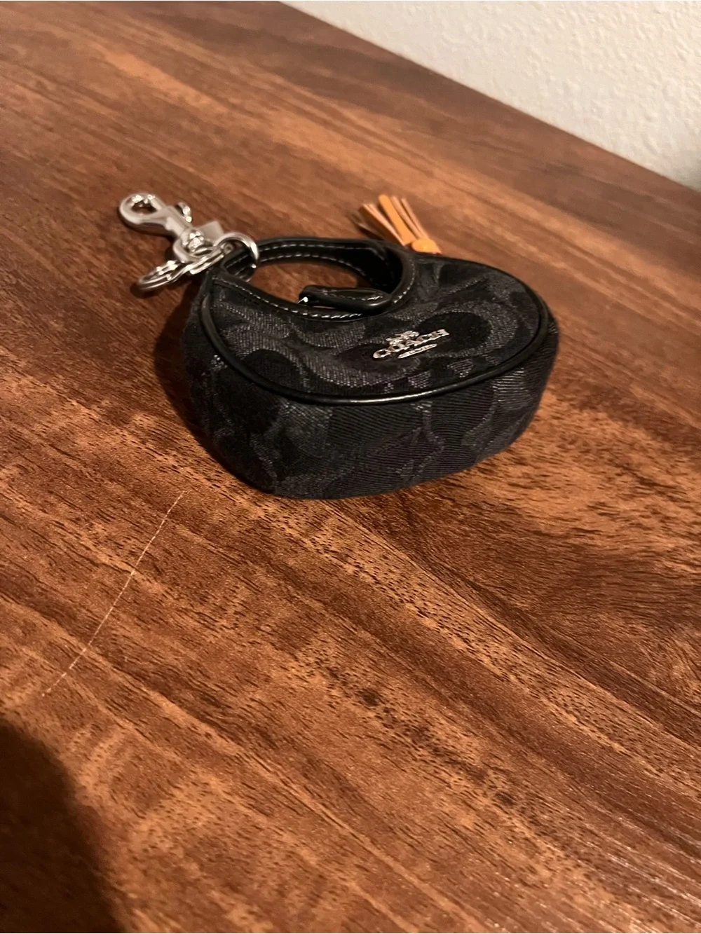 Coach Black Mini Signature Circle Bag Charm with Tan Tassel - Picture 2 of 11